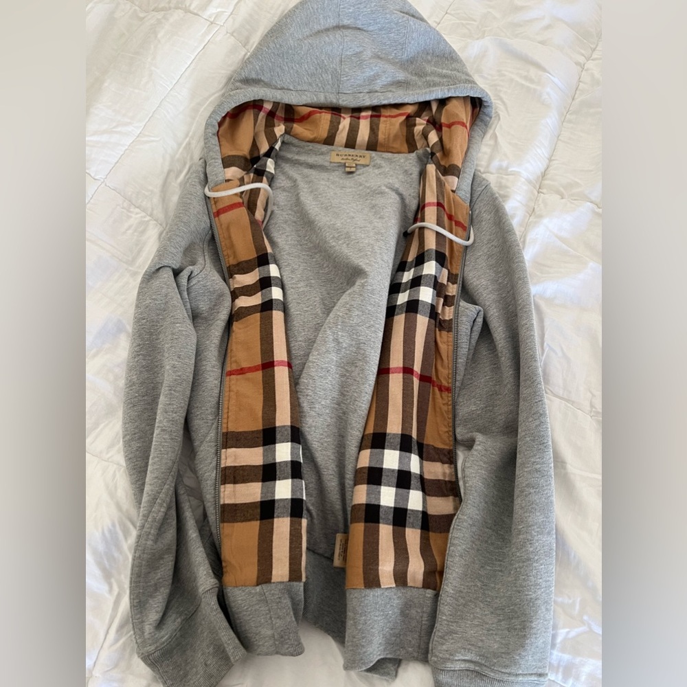 Gray Burberry sweater used just a couple of times. No stains great condition.
